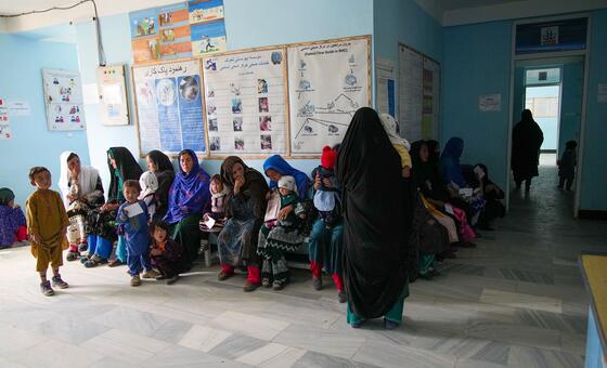 Pregnant and lactating women wait in line at a health clinic in central Afghanistan to receive medical and psychosocial support.